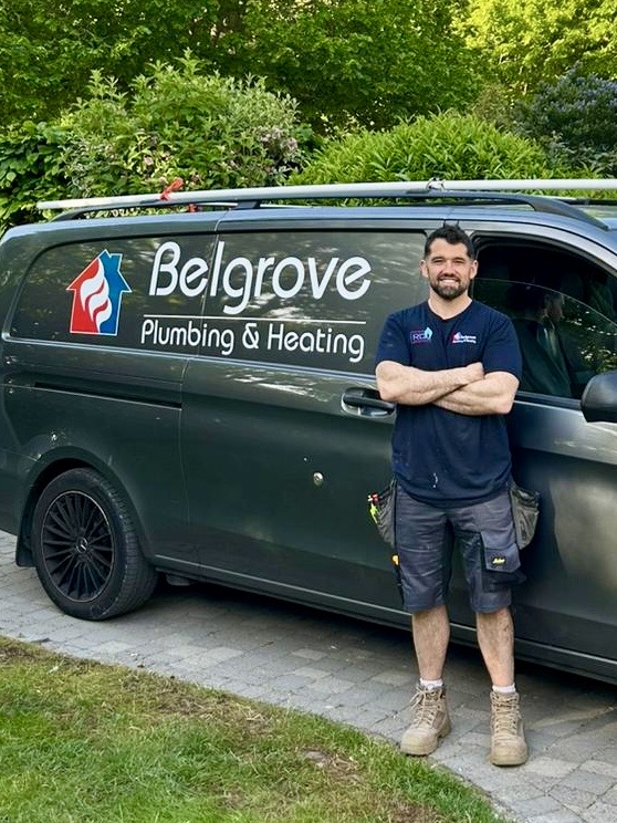 Robbie beside the Belgrove Plumbing & Heating van